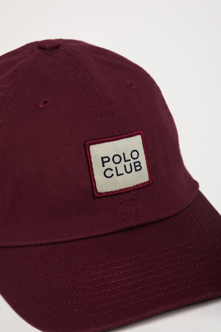 Gorra burdeos con etiqueta Polo Club