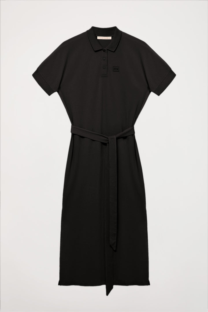 Vestido negro con manga dolman y bordado al tono