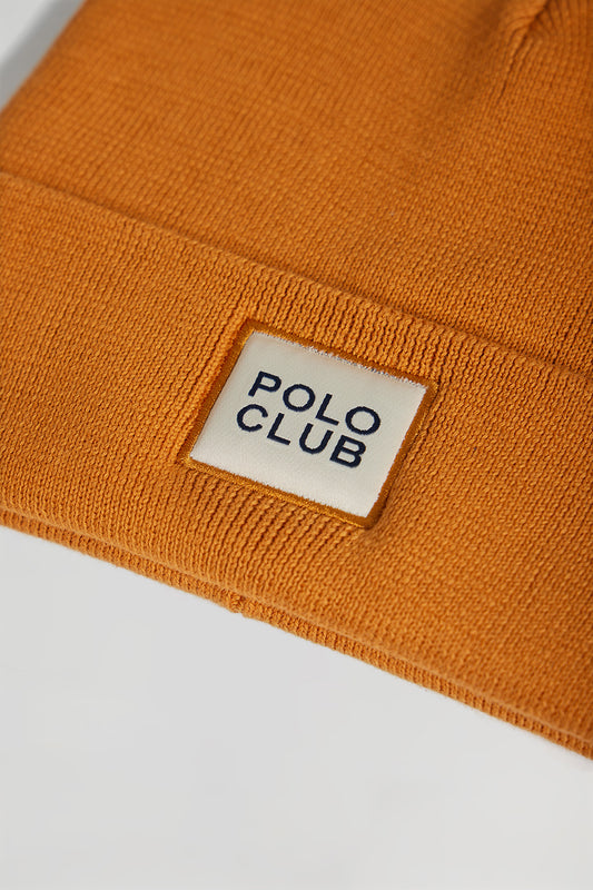 Gorro color cúrcuma de lana unisex con detalle Polo Club