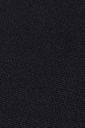 Black round-neck jumper with pearly button detail