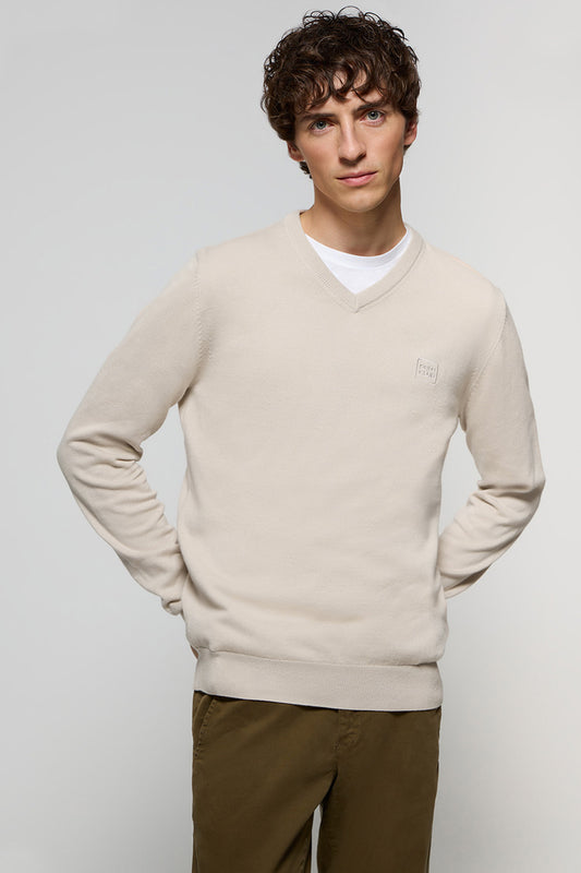 Beige V-neck basic jumper with embroidered logo in matching colour