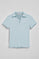 Polo Pedraza sin botones azul claro con logo engomado Polo Club