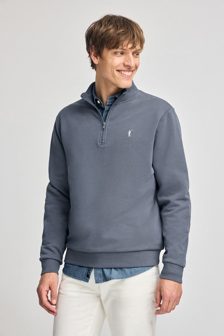 Denim-blue half-zip sweatshirt with Rigby Go embroidery