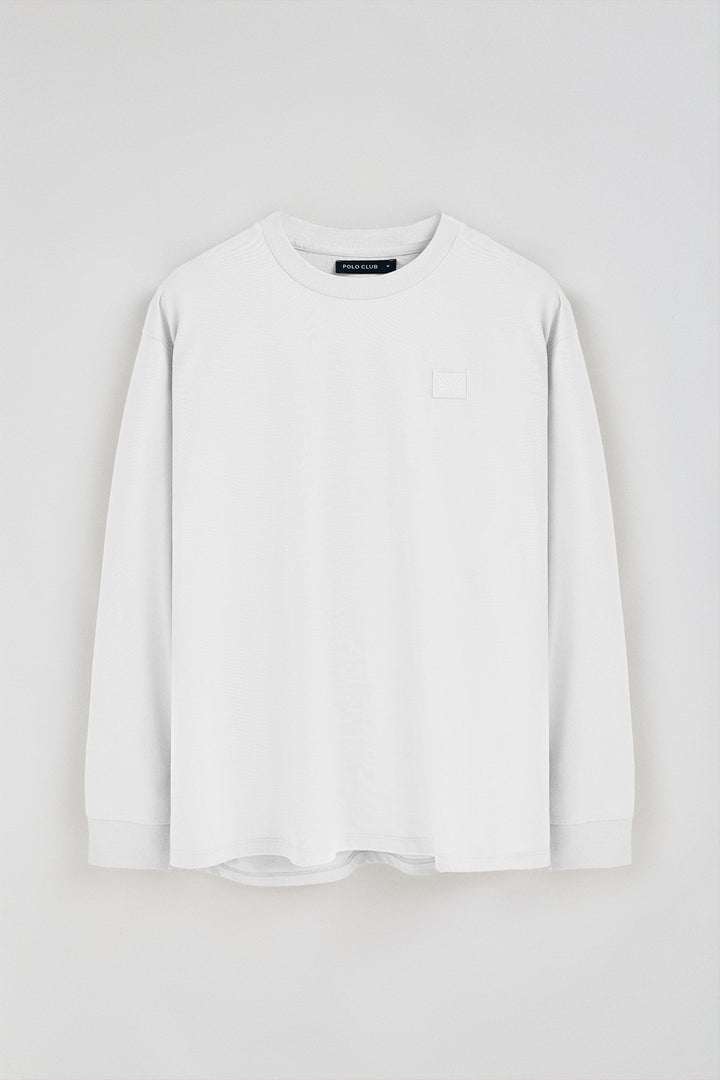 Camiseta blanca holgada con detalle Polo Club