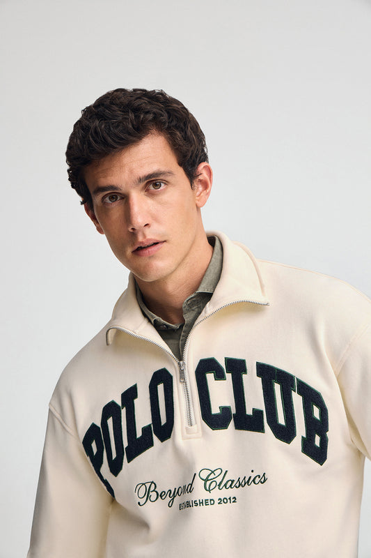 Zapinana pod szyją na zamek bluza w kolorze ecru, z logo Established 2012 Polo Club