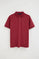 Burnt-red short-sleeve polo shirt with Rigby Go embroidered logo