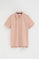 Bleekroze polo met regular fit en geborduurd Rigby Go-logo