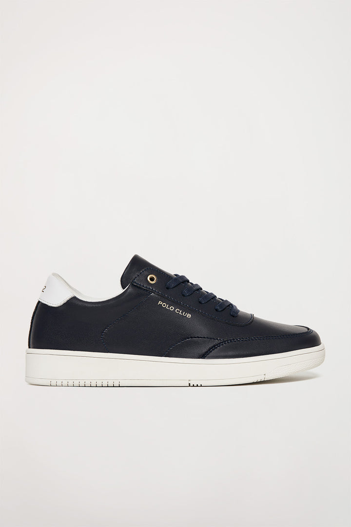 Sapatilha casual azul marinho de pele com pormenores dourados