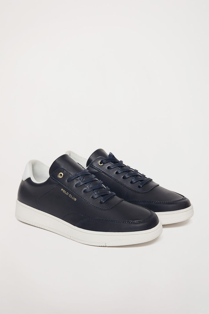Sapatilha casual azul marinho de pele com pormenores dourados
