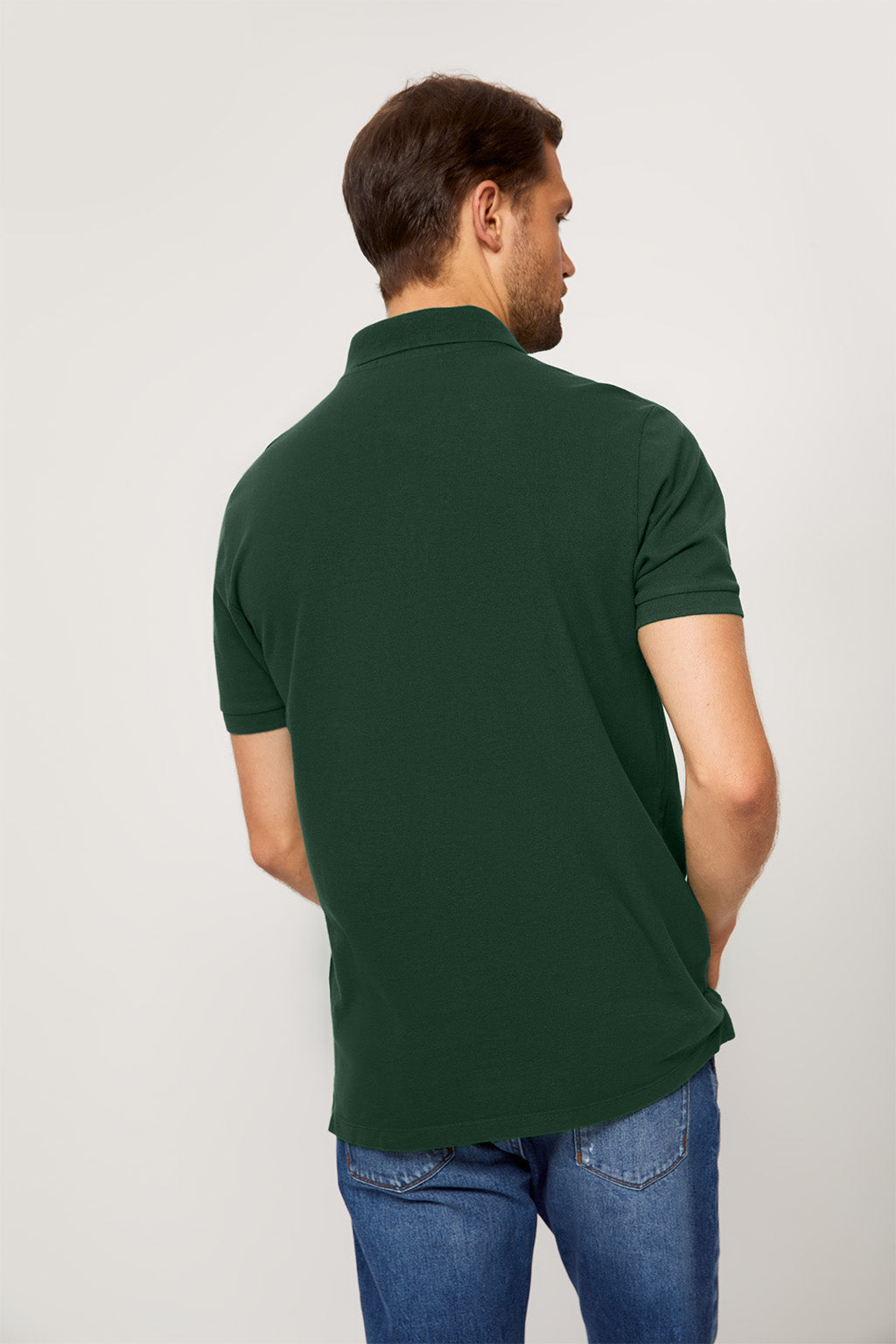 Polo verde botella piqué con tapeta de tres botones y logo bordado en contraste | HOMBRE  | POLO CLUB