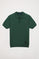 Polo de malha verde garrafa com pormenor na parte inferior