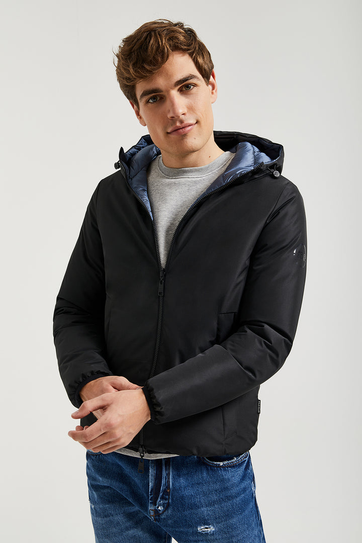 Chaqueta negra reversible con parche y uvi print