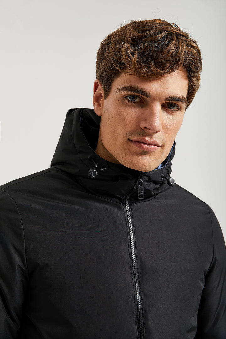 Chaqueta negra reversible con parche y uvi print