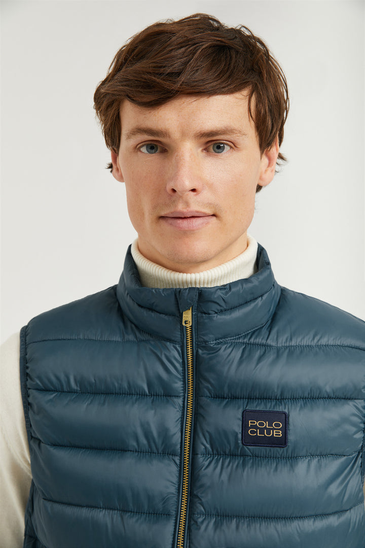 Chaleco azul petróleo Pavel reciclado y ultraligero con etiqueta textil Polo Club