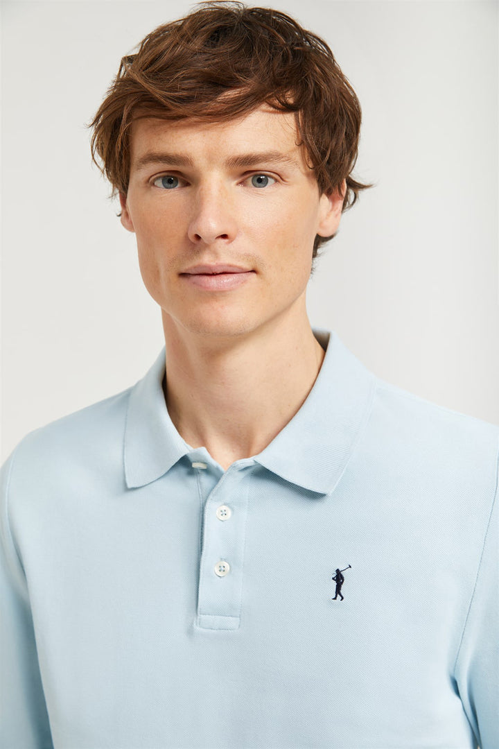 Polo de manga larga azul cielo con bordado Rigby Go