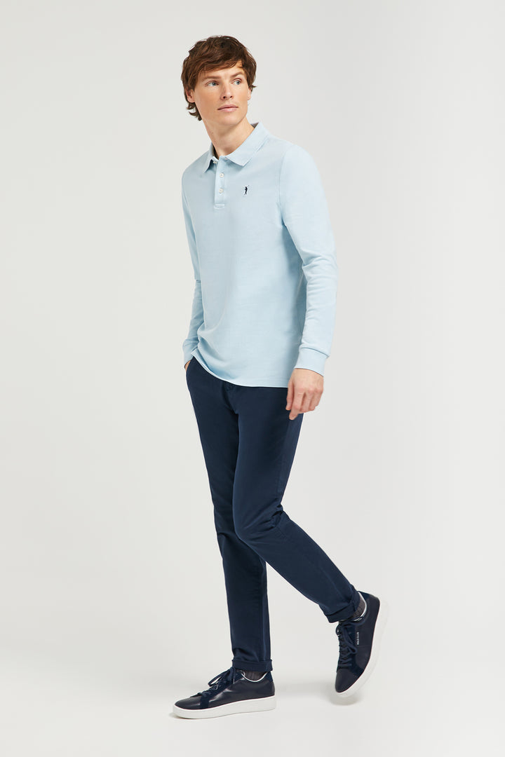 Polo de manga larga azul cielo con bordado Rigby Go