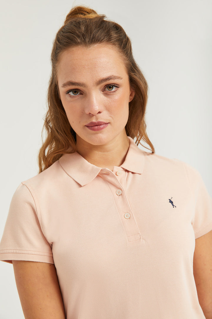 Polo de manga corta piqué color maquillaje con logo Rigby Go