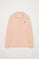 Blush-pink long-sleeve pique polo shirt with Rigby Go logo
