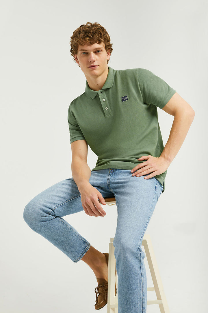 Green pique polo shirt with three-button placket and Polo Club detail