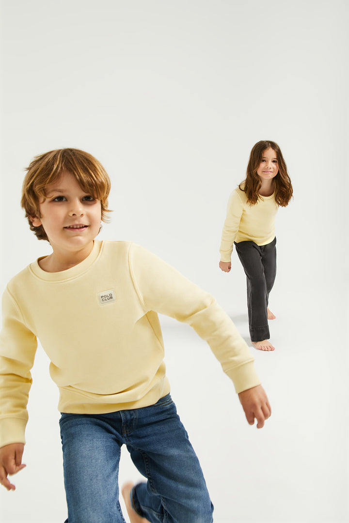 Sweatshirt orgânica com decote redondo amarela Neutrals kids com logótipo