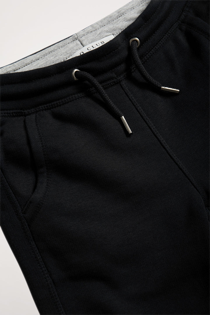 Pantalón jogger orgánico negro Neutrals kids con logo