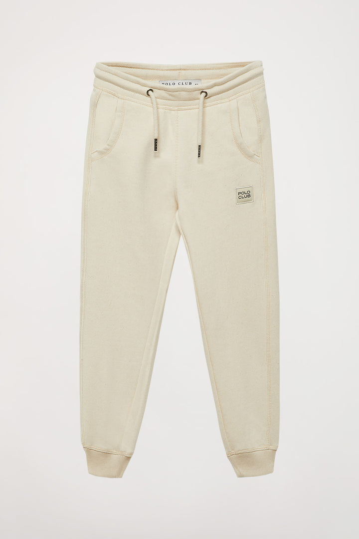 Pantalón jogger orgánico beige Neutrals kids con logo