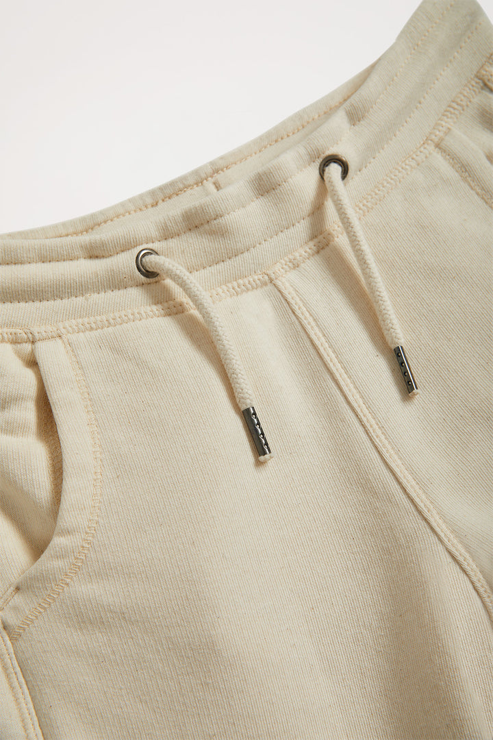 Pantalón jogger orgánico beige Neutrals kids con logo